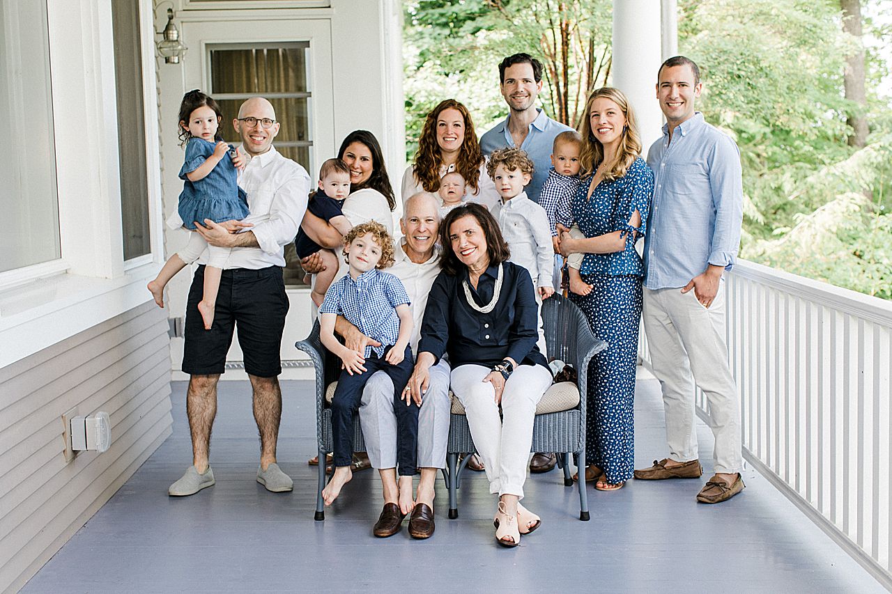Extended family portraits on a porch in Northern Michigan