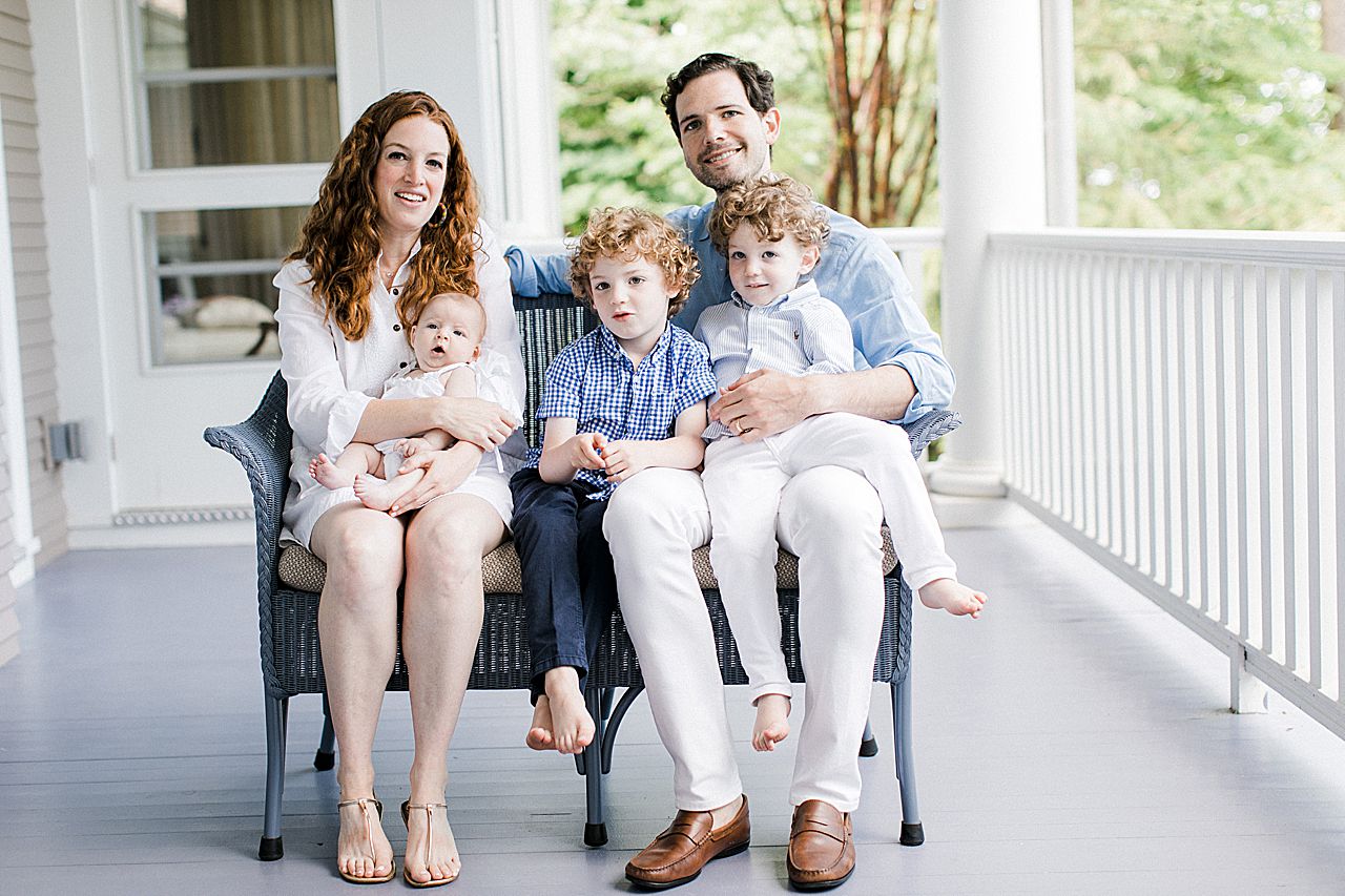 Family portraits on a porch in Northern Michigan