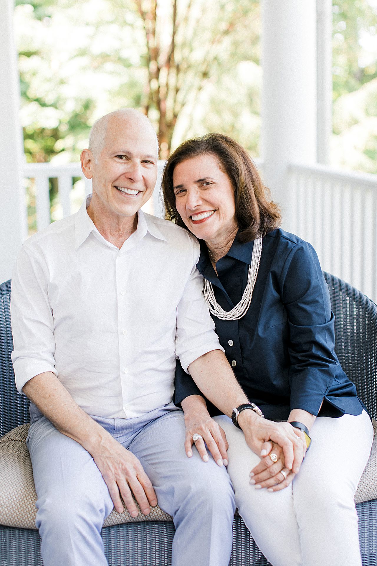 Portrait of a Grandma and Grandpa on a porch in Charlevoix, Michigan