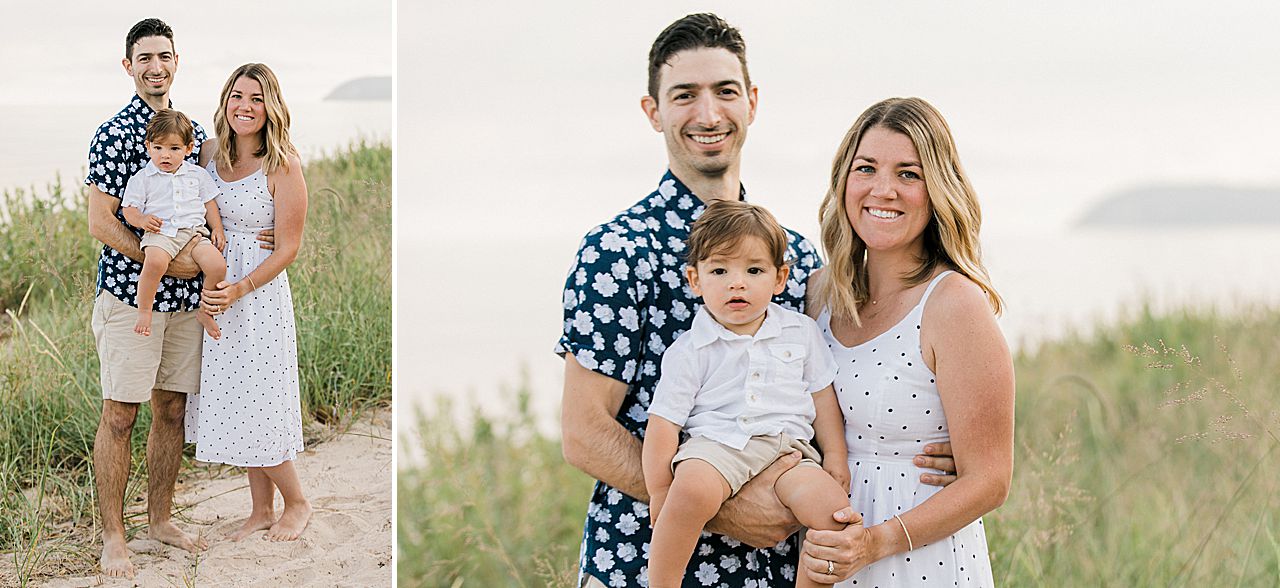 Parents with their toddler on a beach in Good Harbor, Michigan