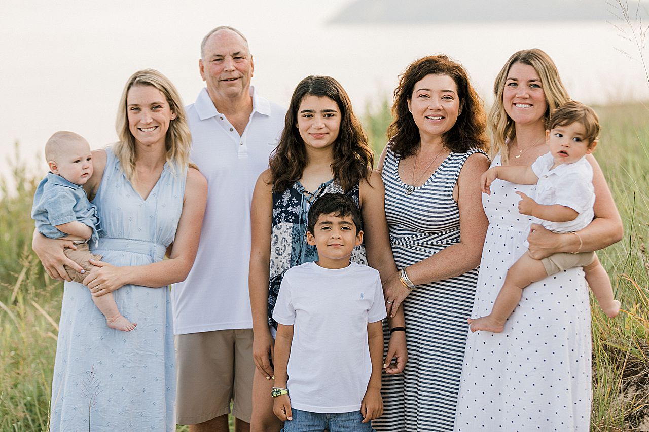 Family posing near Lake Michigan