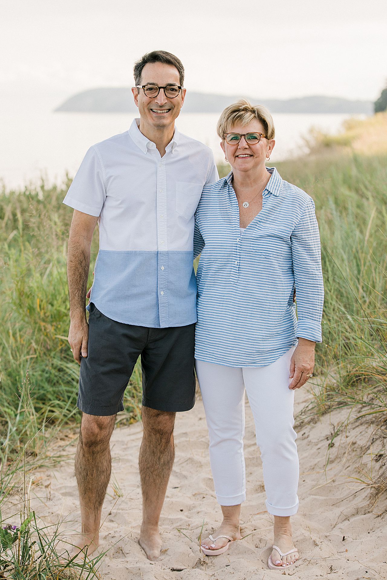 Family portraits on a beach near Lake Michigan