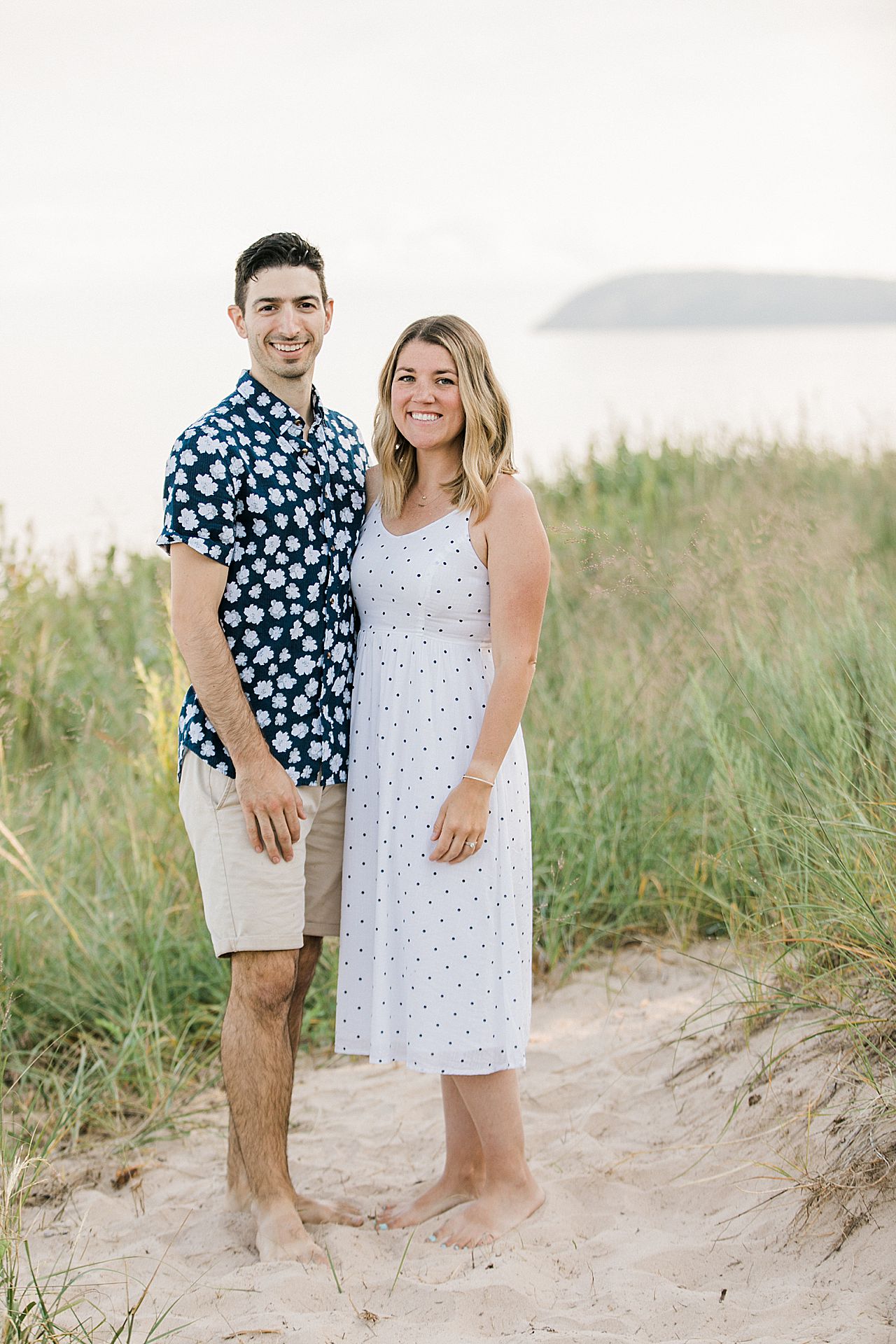 Young couple on a beach in Lake Leelanau, Michigan