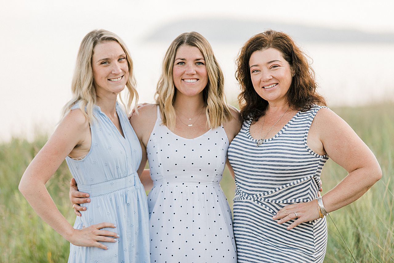 Three sisters on a beach in Lake Leelanau, Michigan