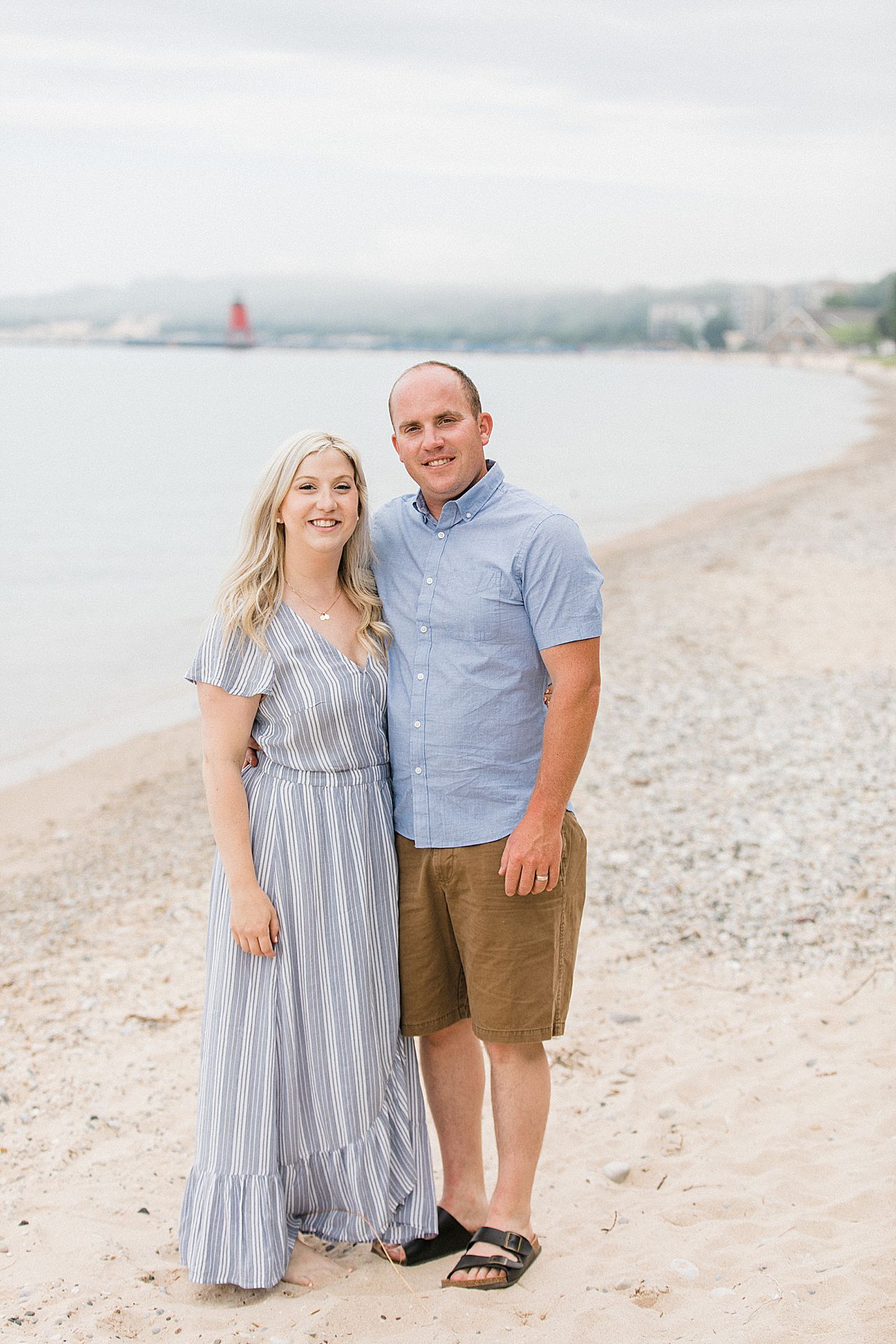 Young couple on a beach in Charlevoix, Michigan
