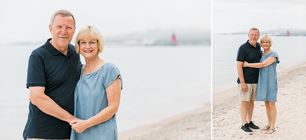 Grandparents hugging on a beach in Northern Michigan