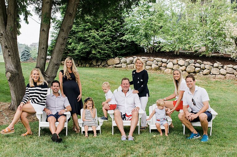 Family portrait on a lawn on the Old Mission Peninsula in Michigan