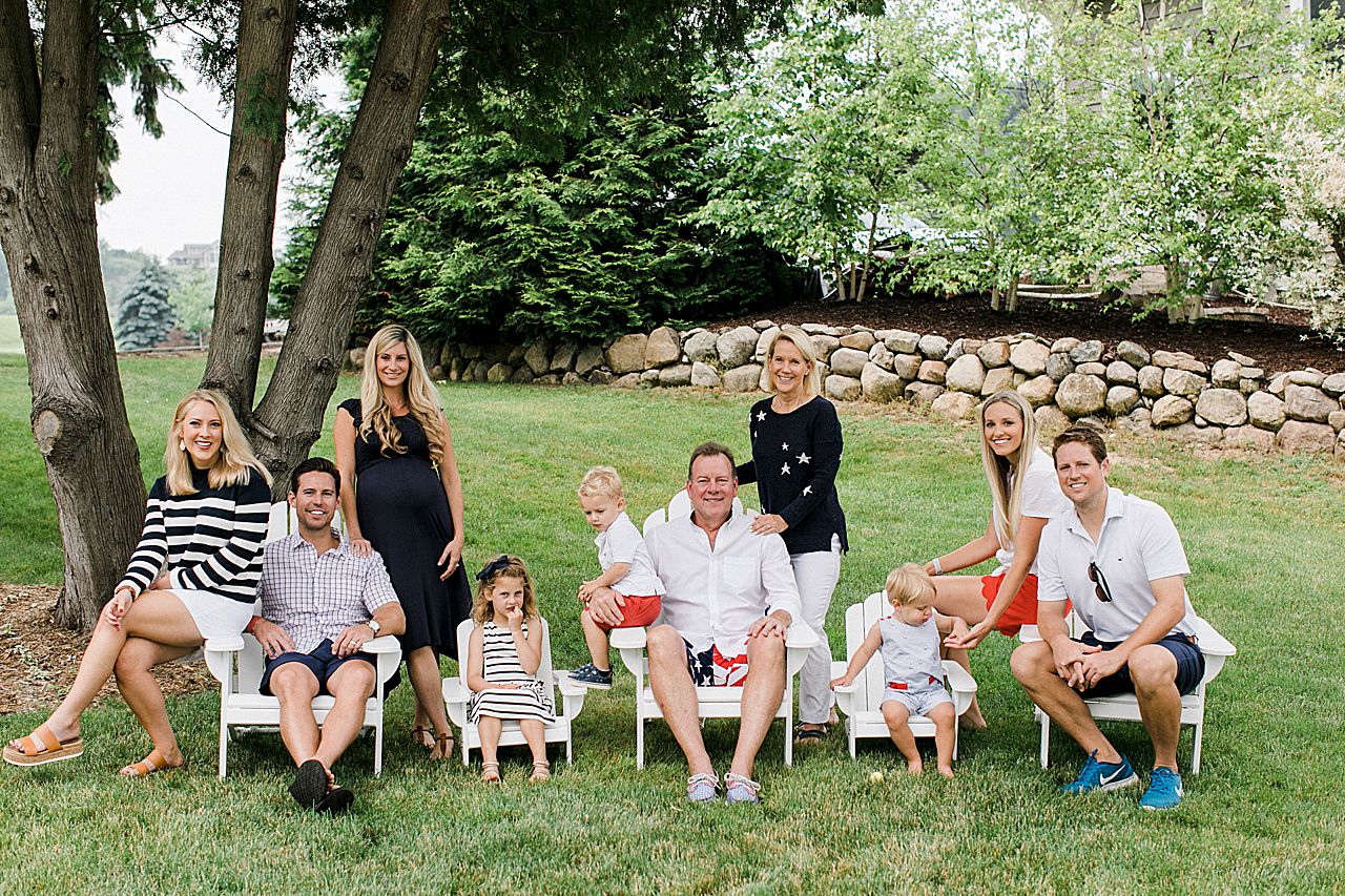 Family portrait on a lawn on the Old Mission Peninsula in Michigan