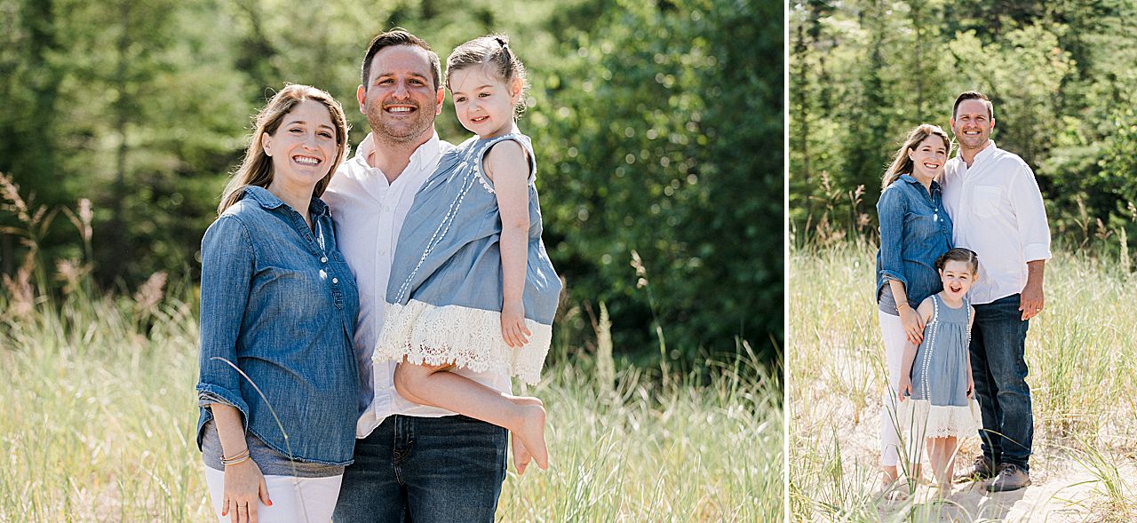 Mother and father holding their daughter in Petoskey, Michigan