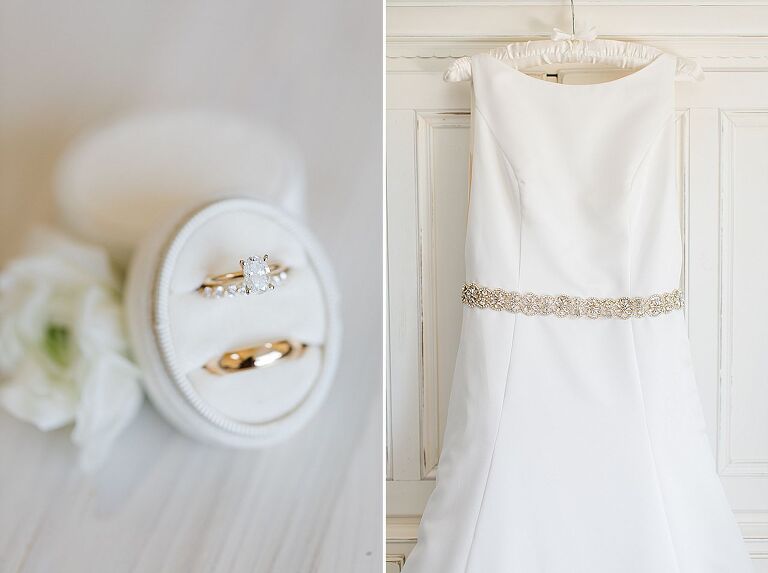 White high neck wedding dress with a sparkly belt around the waist hanging from a white armoire dresser