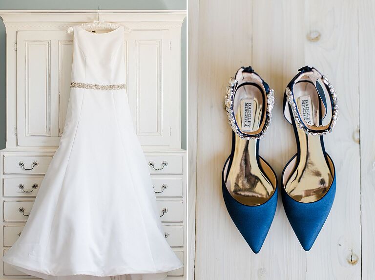 A white wedding dress embellished with a sparkly belt and pointy, navy blue, flat Badgley Mischka shoes accented with sparkly crystals at the ankle strap