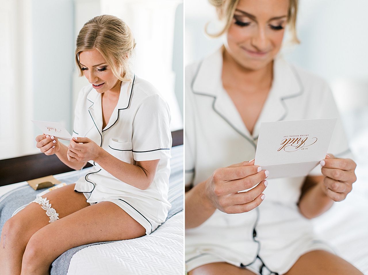 A bride sitting on a bed in a white pajama set reading a card from the groom before getting dressed