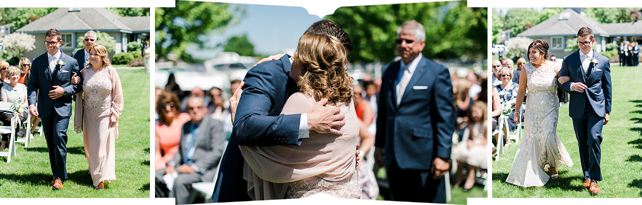 Groom walking down the aisle with his mother and father, hugging his mother