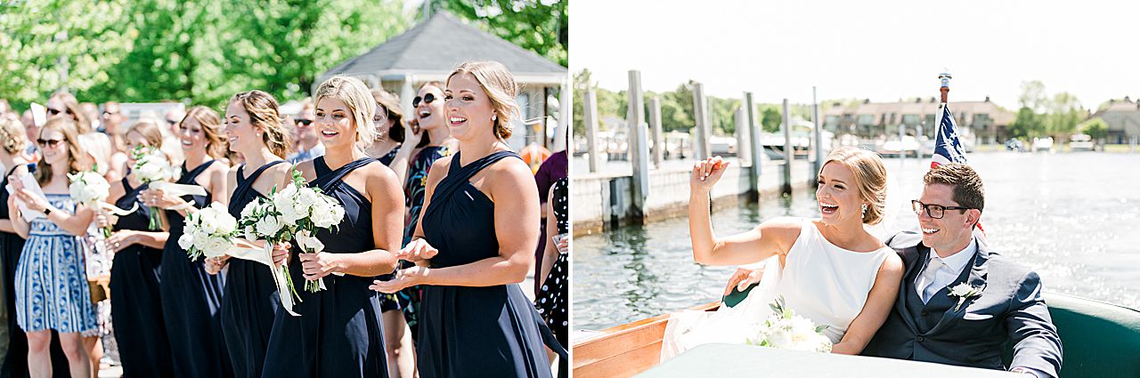Bride and groom on a Chris Craft boat waving to their wedding guests on the dock