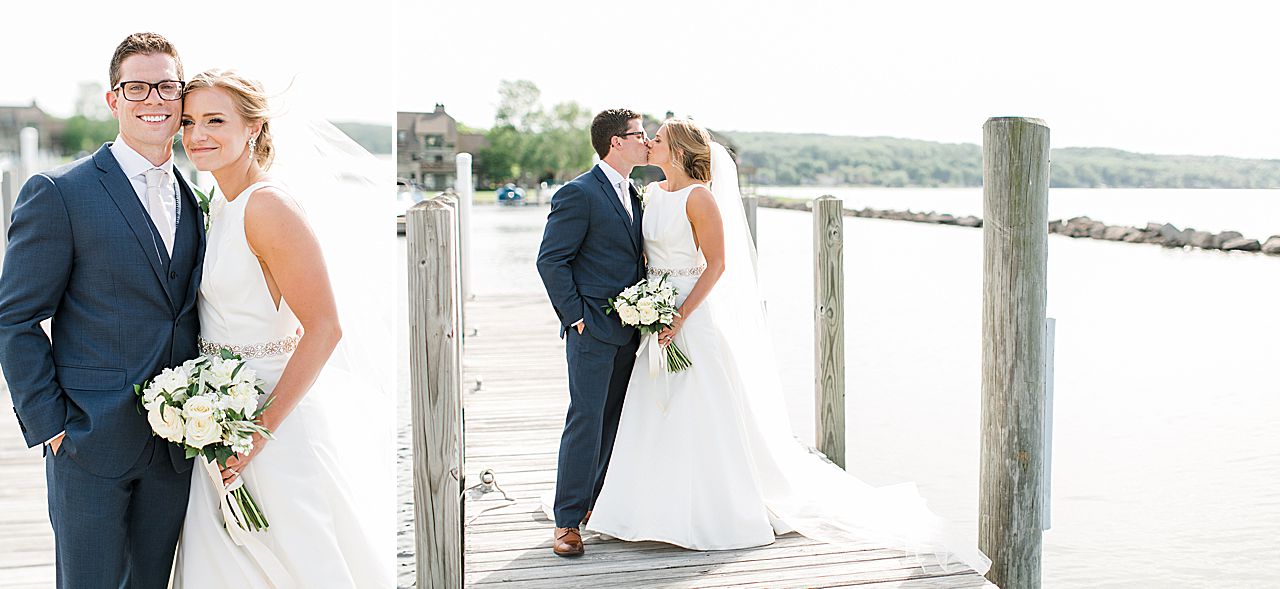Bride and groom kissing on their wedding day on a dock in Boyne City, Michigan