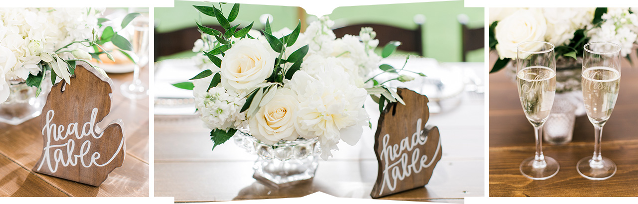 Wooden Michigan cutouts with writing as table markers and champagne flutes with Mr and Mrs engraved on them at Boyne Mountain Resort