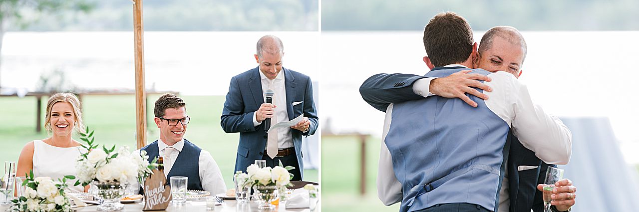 The groom giving the best mad a hug aster his speech at a wedding reception in Boyne Falls, Michigan