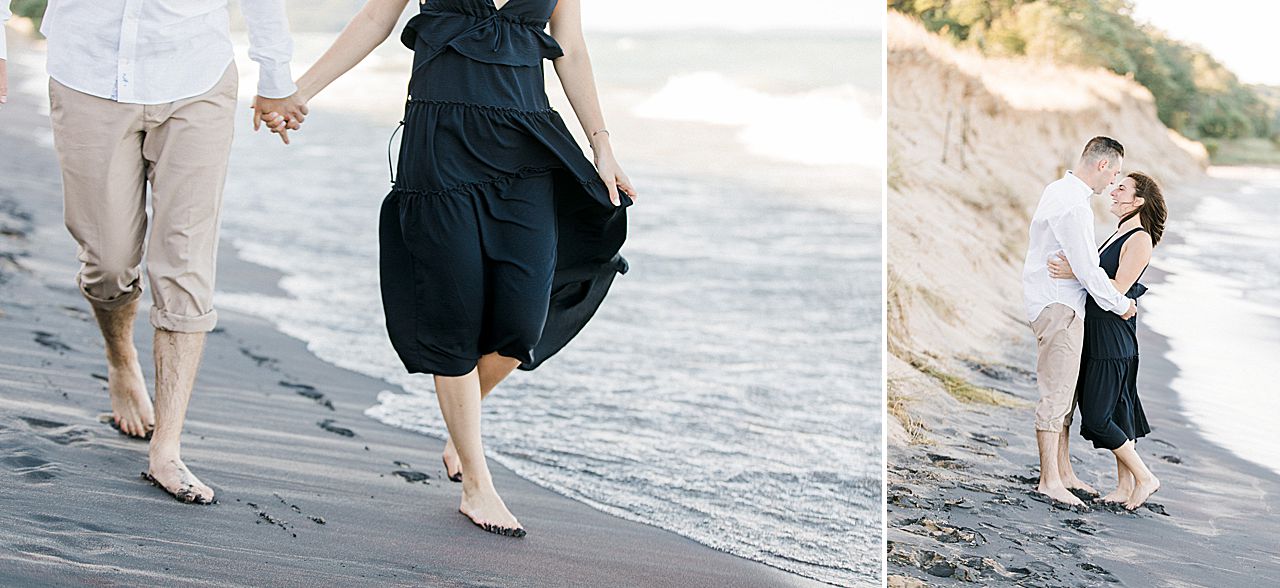 This is an engaged couple walking along Lake Michigan in Empire, Michigan