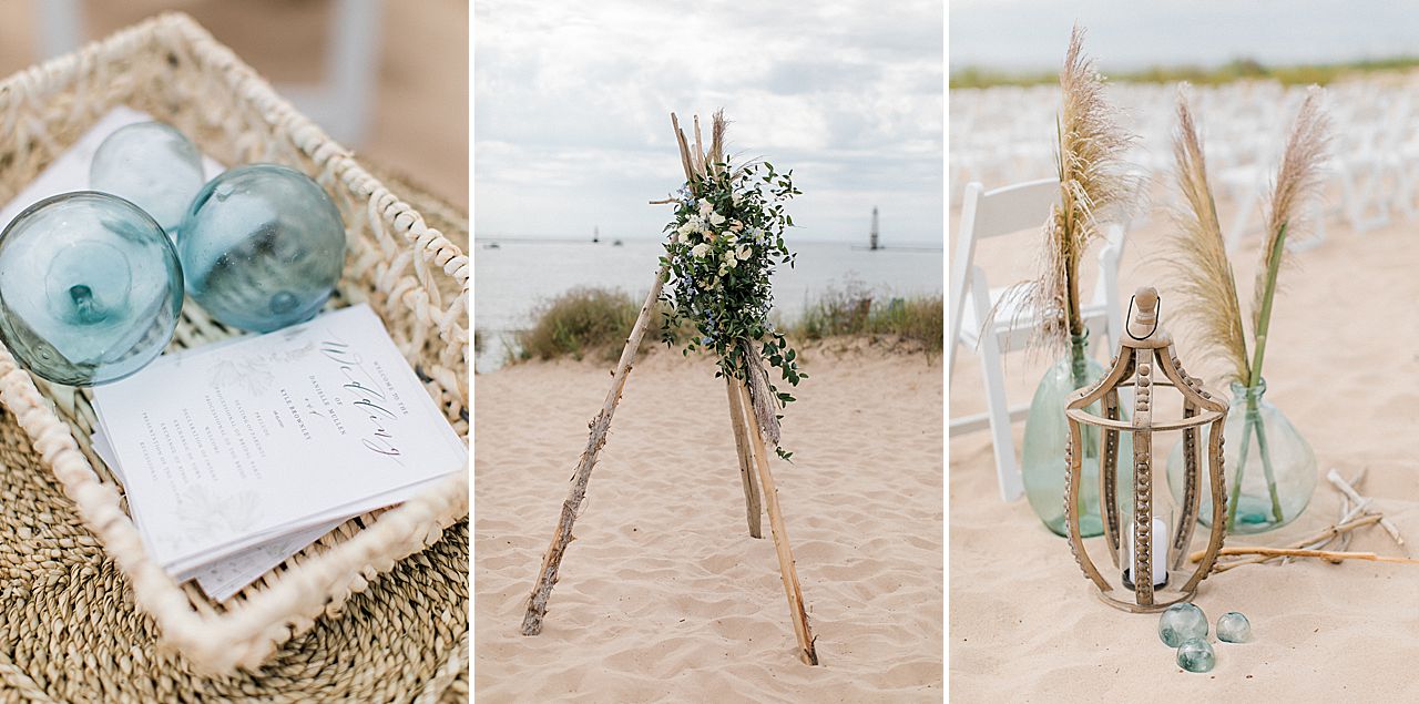 A wedding ceremony details of pampas grass in glass jugs, a driftwood arch and ceremony details on a printed paper