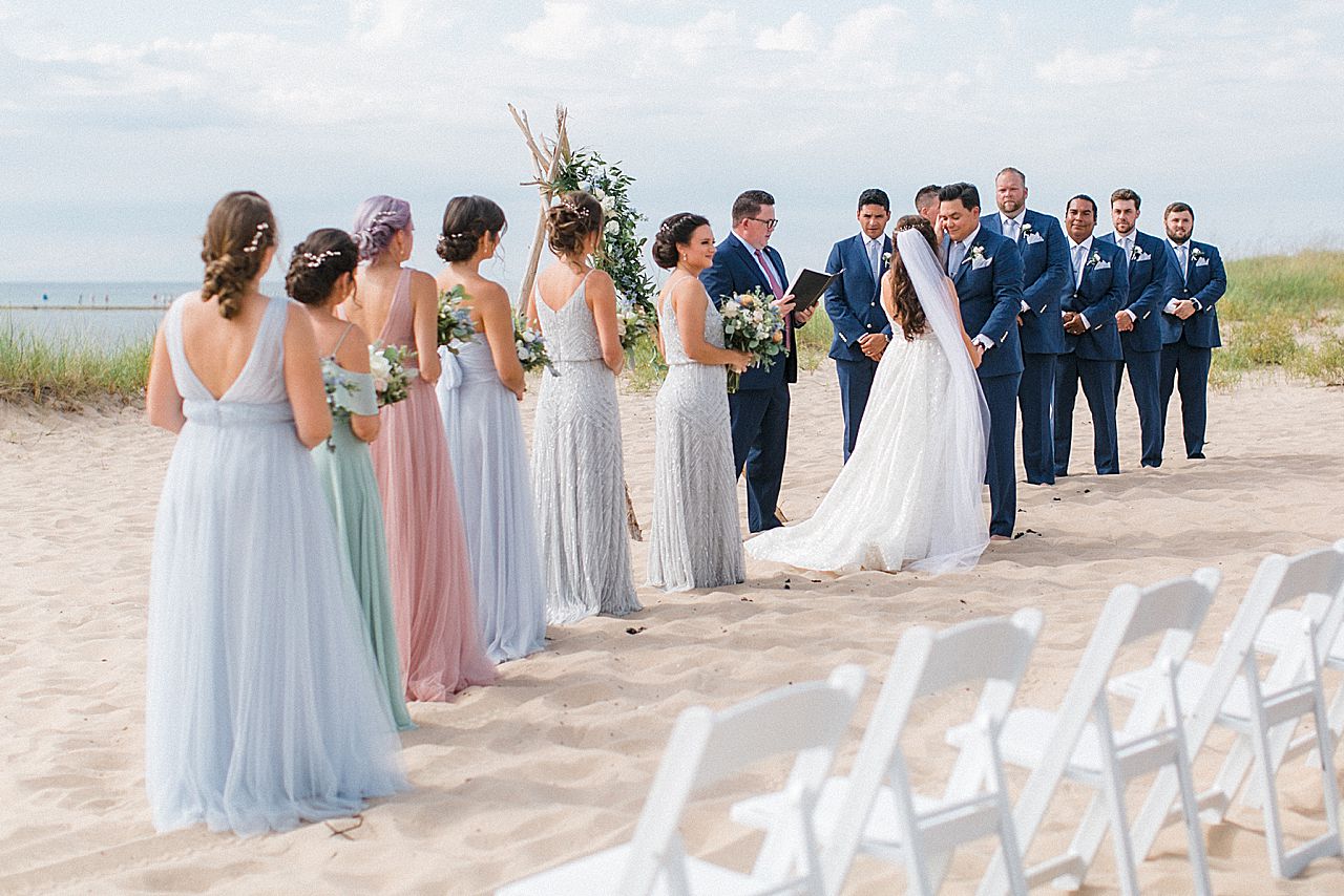 A wedding ceremony in Frankfort, Michigan by the beach