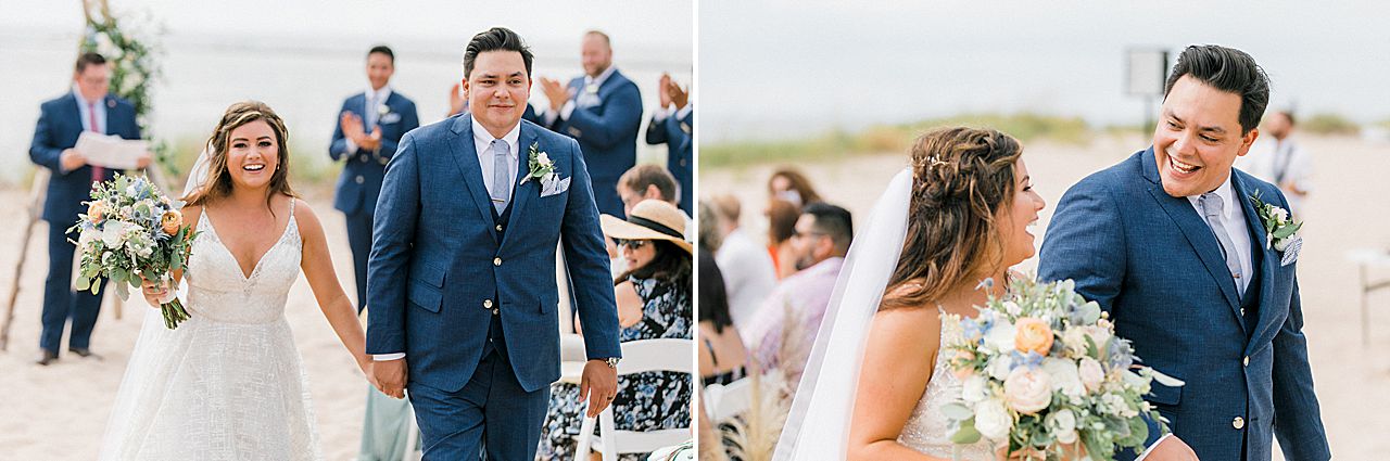 A bride and groom walking down the aisle at their wedding ceremony in Frankfort, Michigan