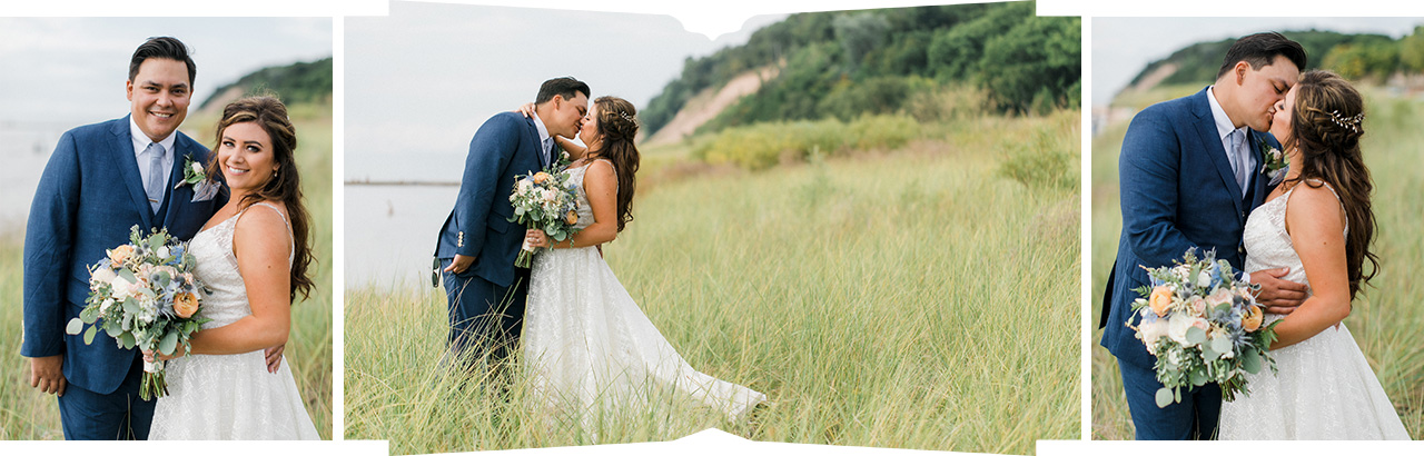 A bride and groom in dune grass on the beach along Lake Michigan in Frankfort, Michigan