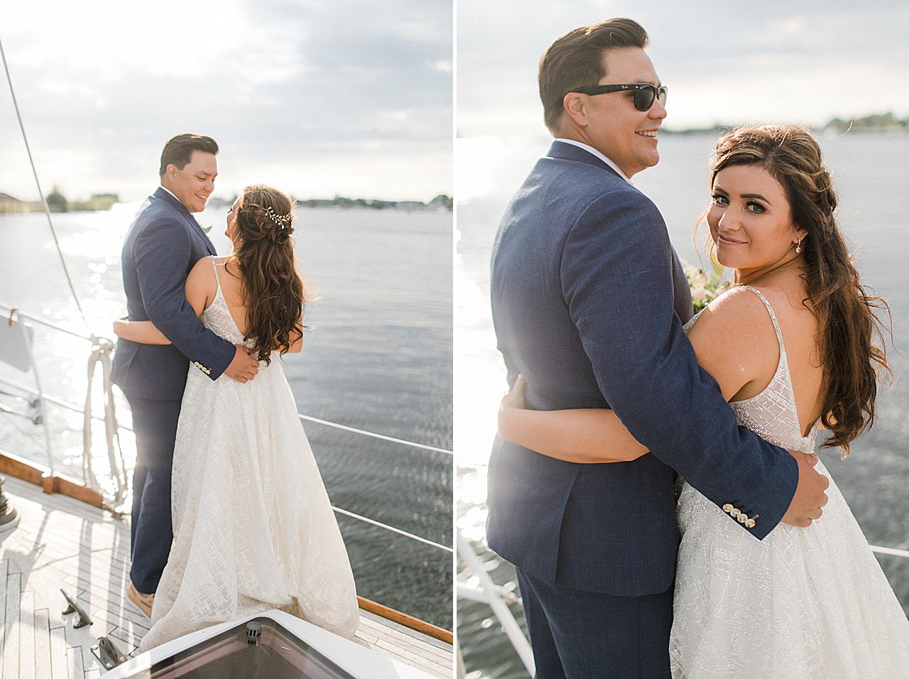 A bride and groom on a sailing boat while approaching their wedding reception in Elberta, Michigan