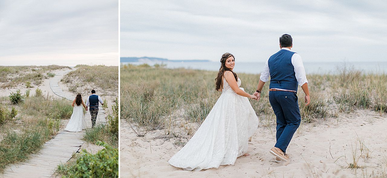 A bride and groom walking to Lake Michigan for sunset photos in Elberta, Michigan