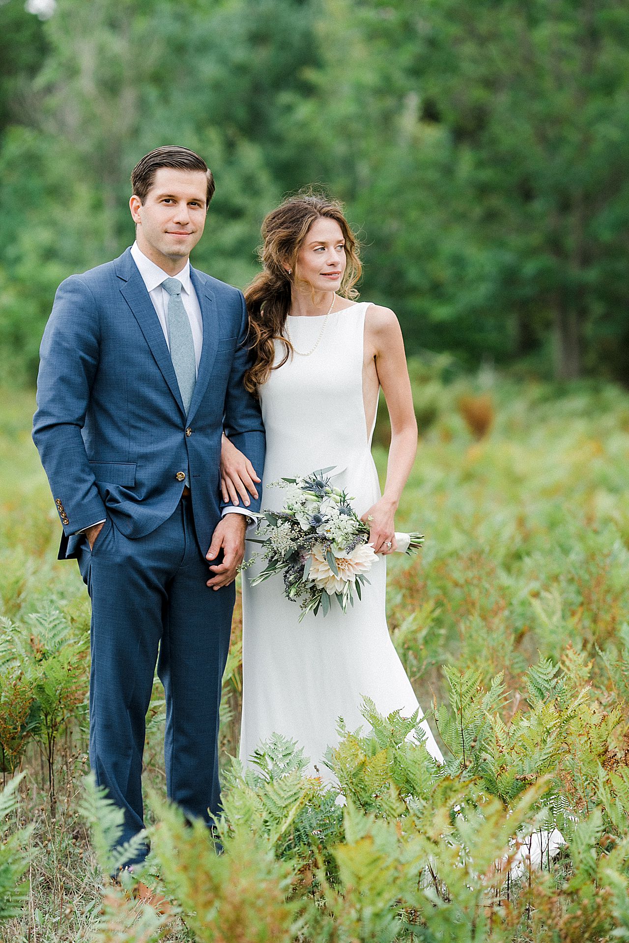 A bride and groom portraits in Leland, Michigan
