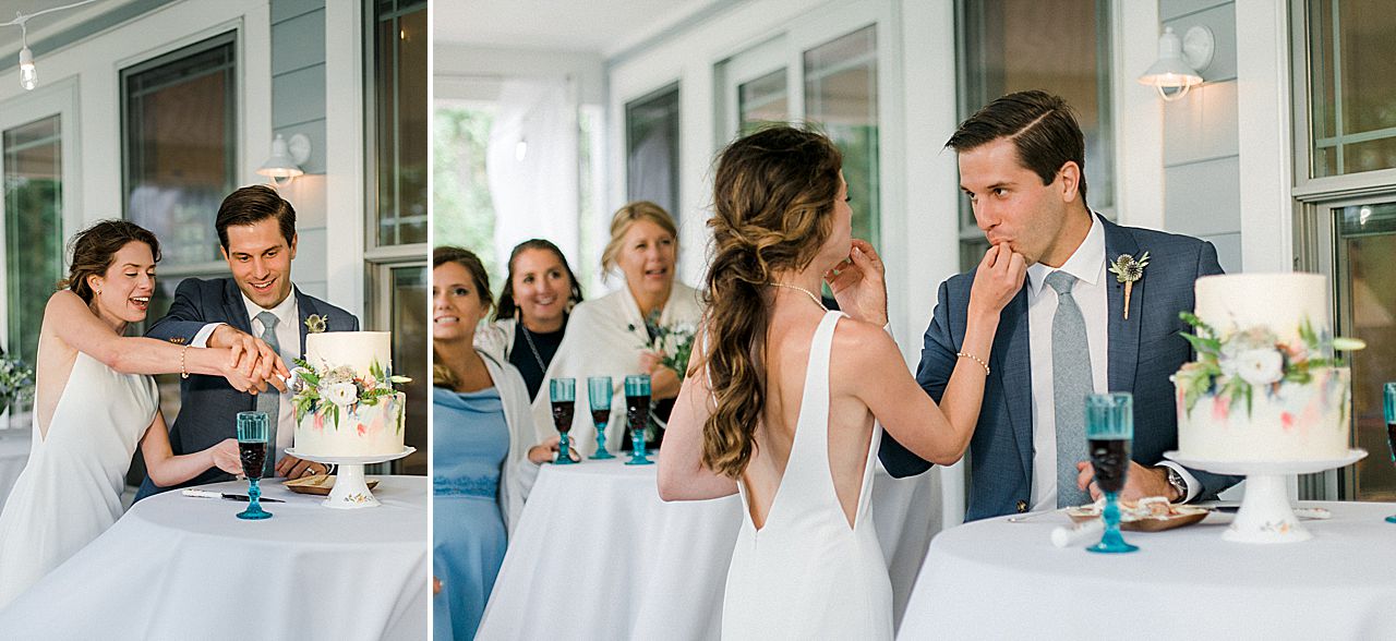 A bride and groom eating their cake on a porch at a private residence in Northport, Michigan
