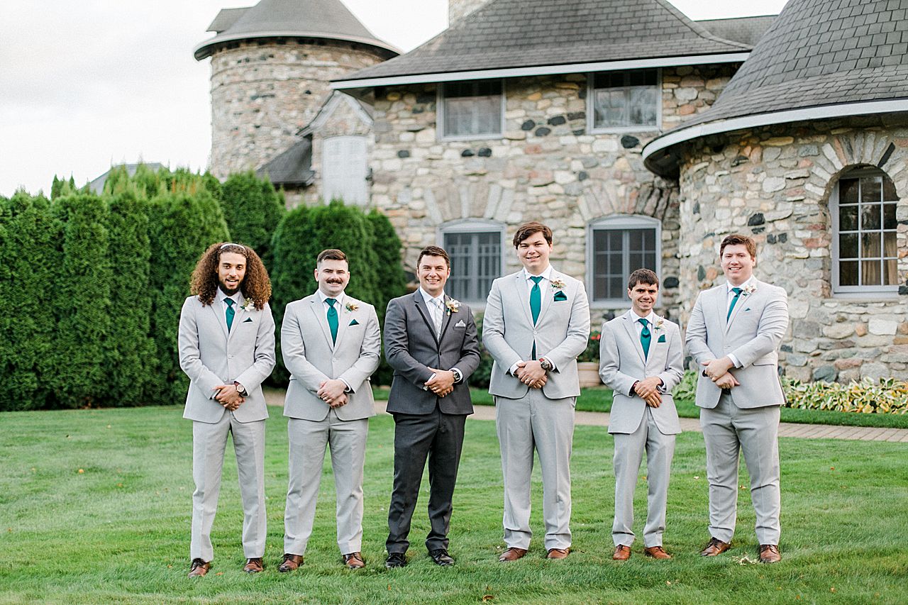 Groom and groomsmen portraits at Castle Farms in Charlevoix, Michigan