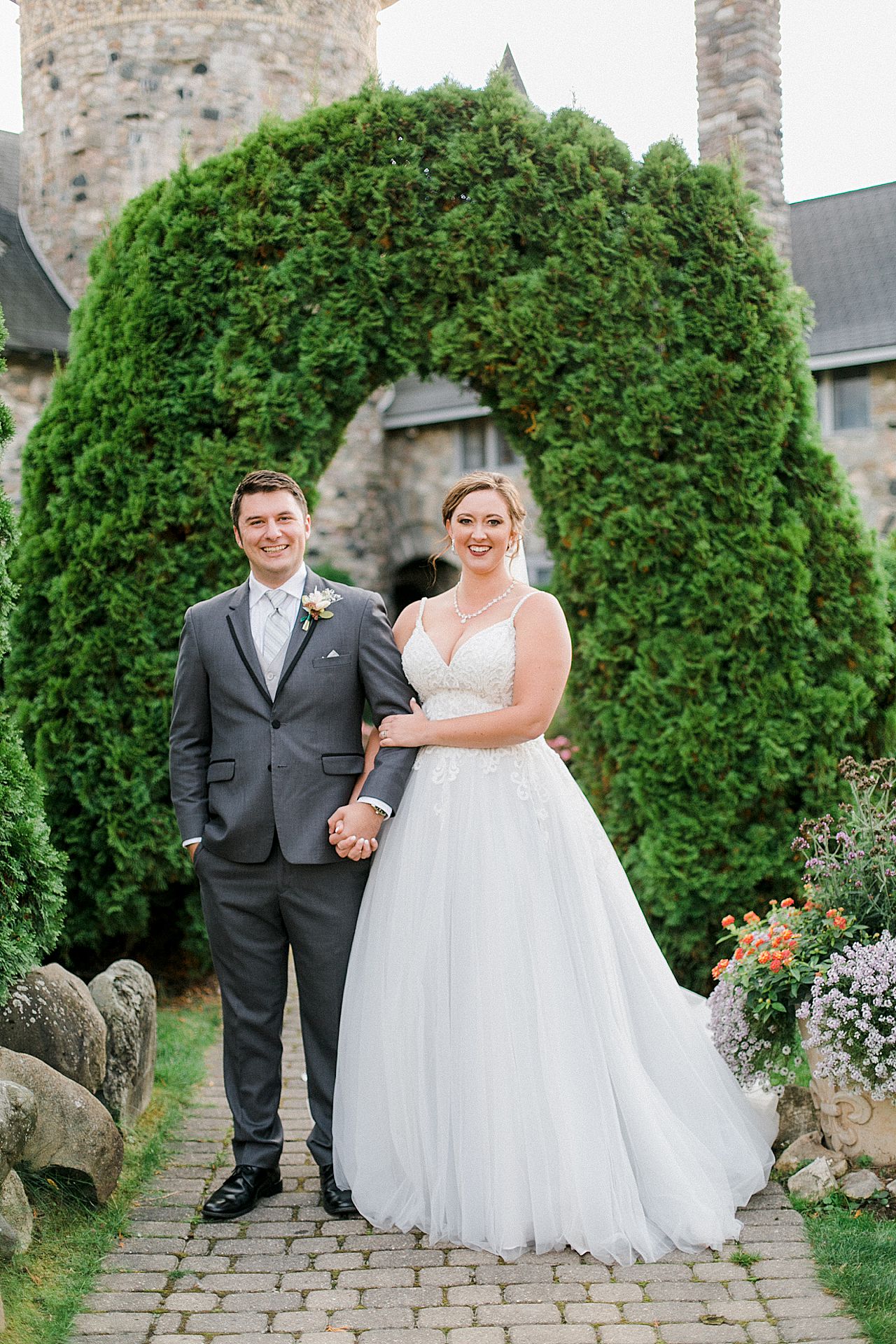 Bride and groom smiling at Castle Farms in Charlevoix, Michigan