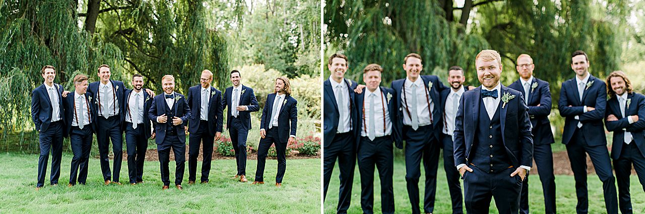 A groom and his groomsmen by a willow tree in Michigan