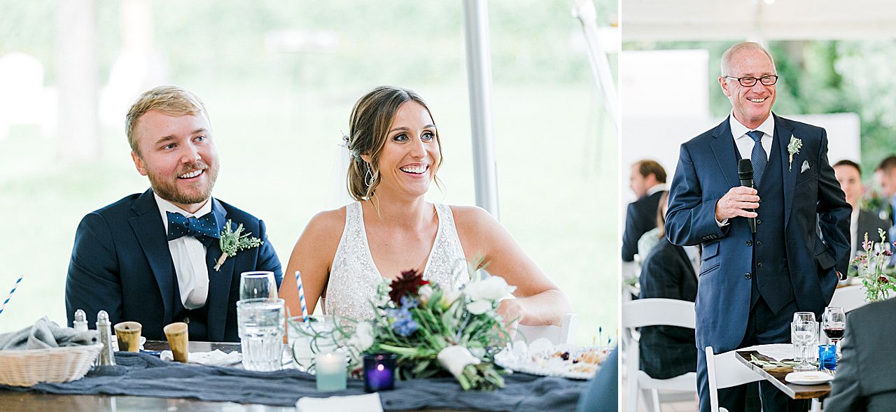 A bride and groom listening to a toast at their wedding reception