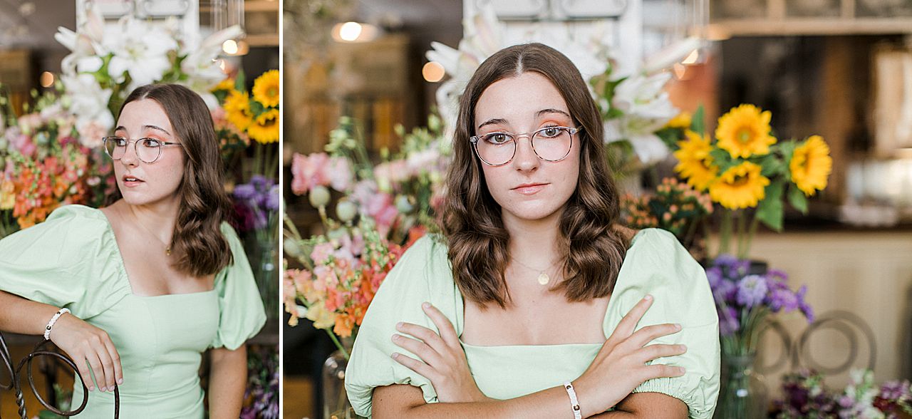 A senior portrait session in Northern Michigan with a girl in a floral shop
