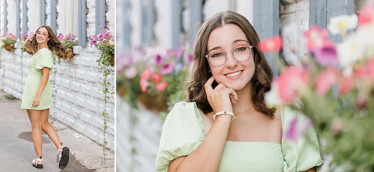 A senior portrait session with a girl walking in downtown Charlevoix