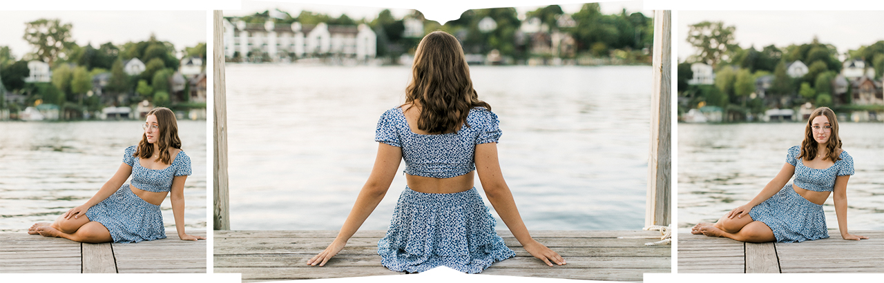 A girl sitting on a dock in the summer in Michigan during her senior portrait session