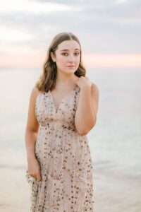 A girl's senior portrait session by Lake Michigan in Charlevoix