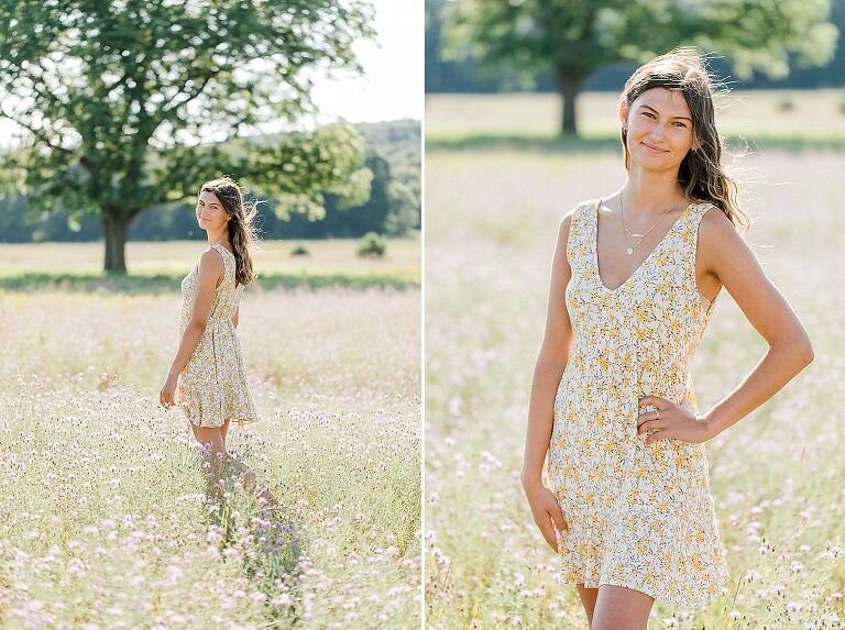 A girl's senior portrait session on a sunny evening in a field in Northern Michigan