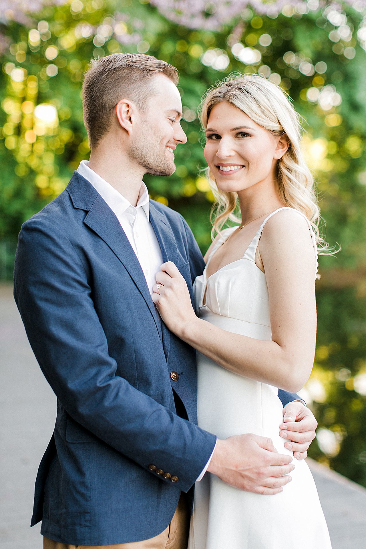 A couple taking engagement photos in Northern Michigan