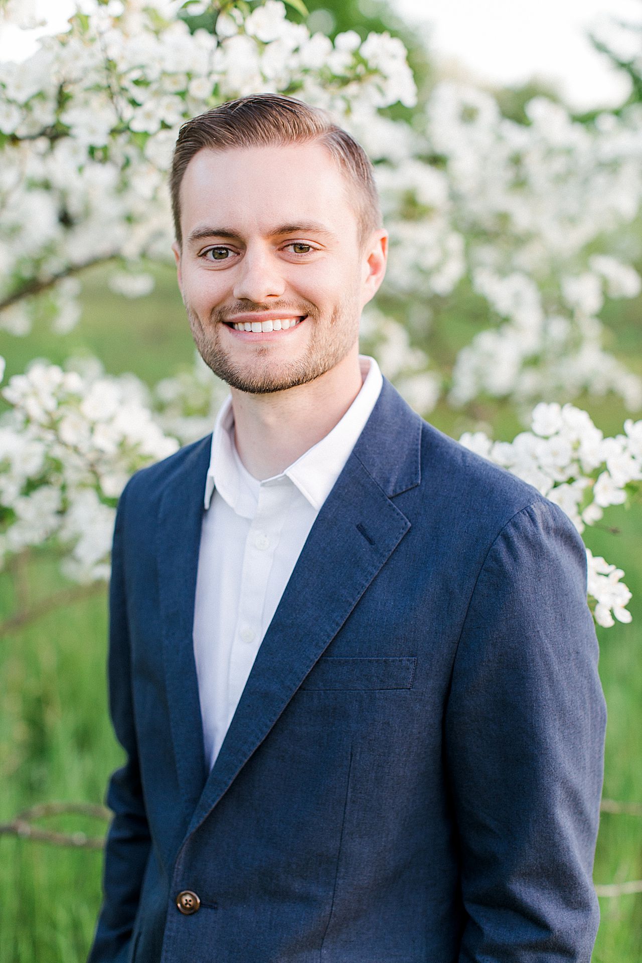 Portraits of a fiancé man in the spring on Old Mission Peninsula