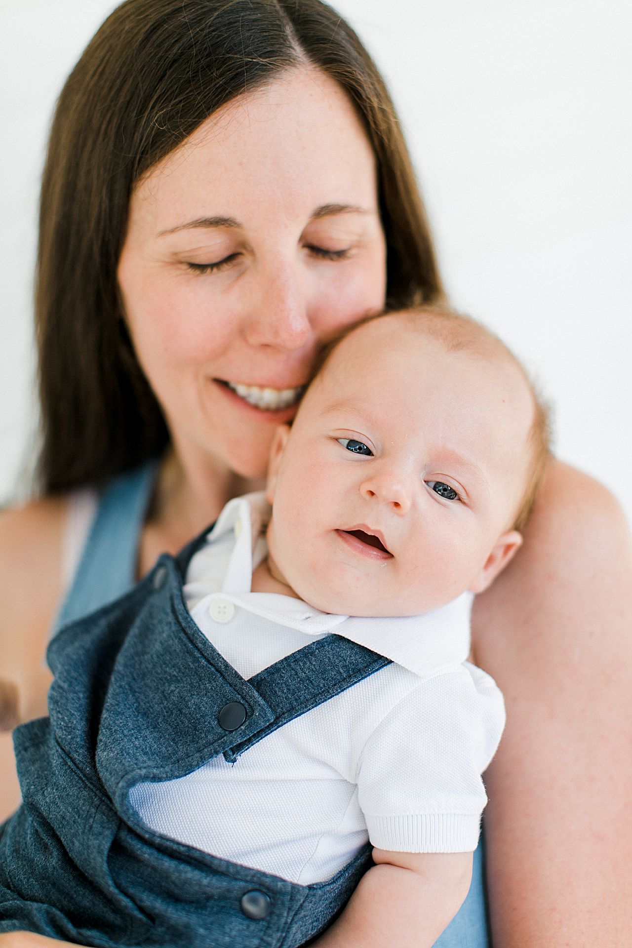 A portrait of a mother and her newborn son in Petoskey, Michigan