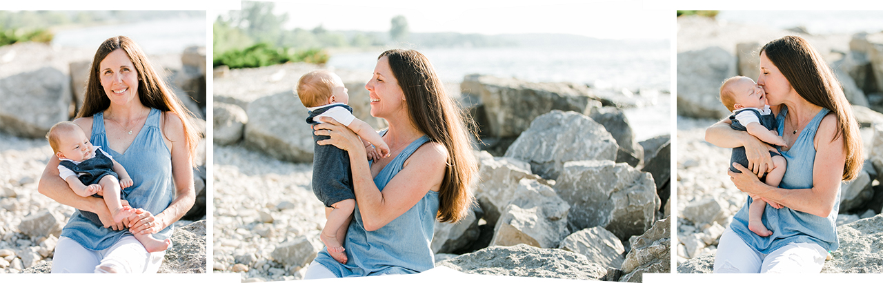 A portrait of a mother and her newborn son in Petoskey, Michigan near the lake