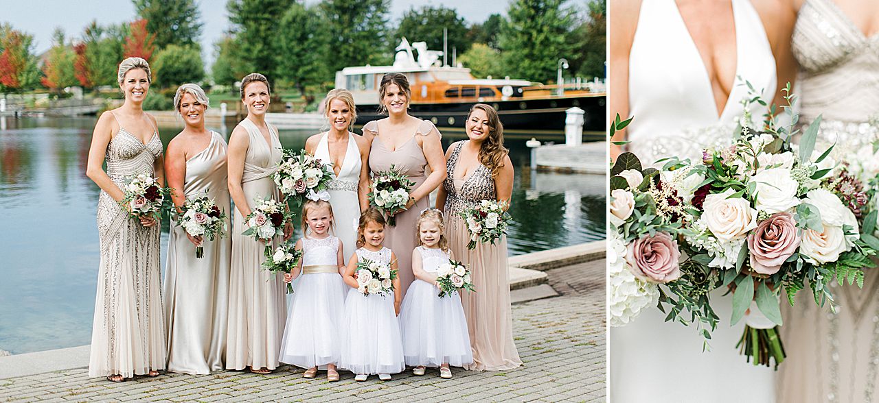 A bride and her bridesmaids by the water in Bay Harbor, Michigan