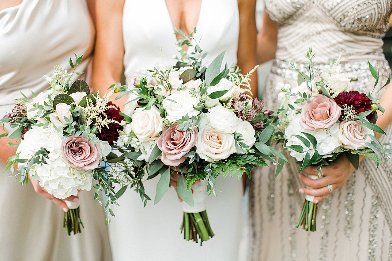 A bride and bridesmaids floral bouquets in Michigan