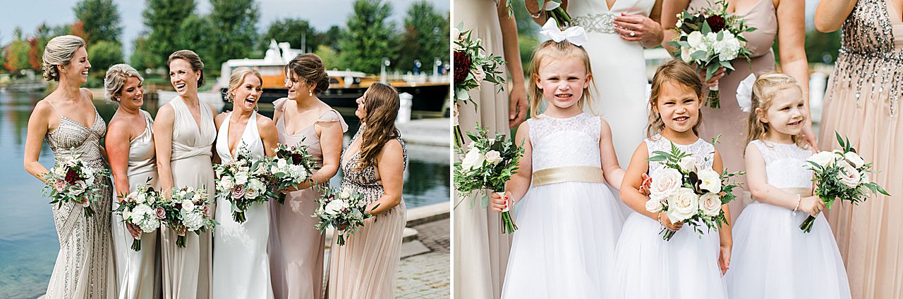A bride and her bridesmaids by the water in Michigan