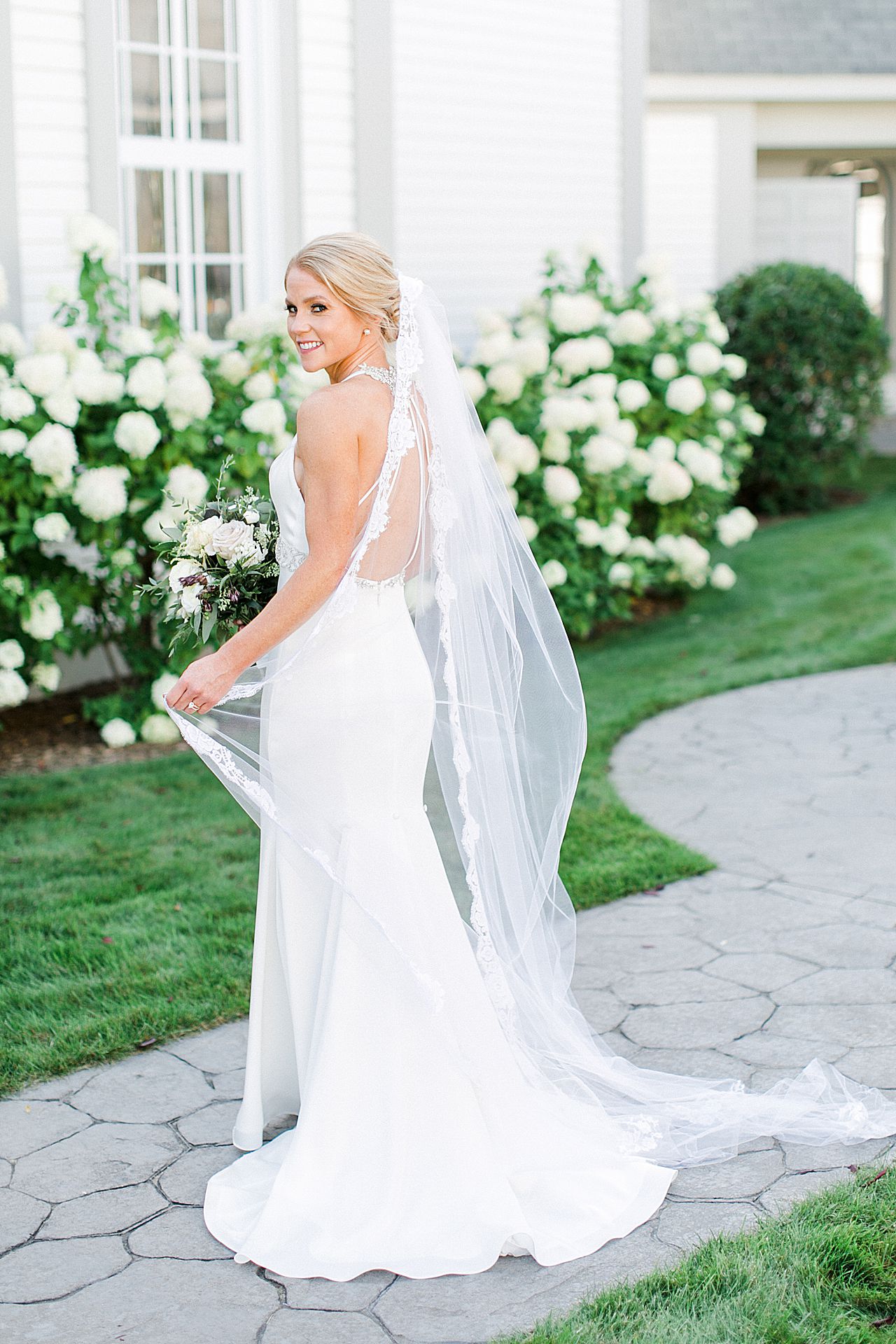 The back of a brides dress in Northern Michigan