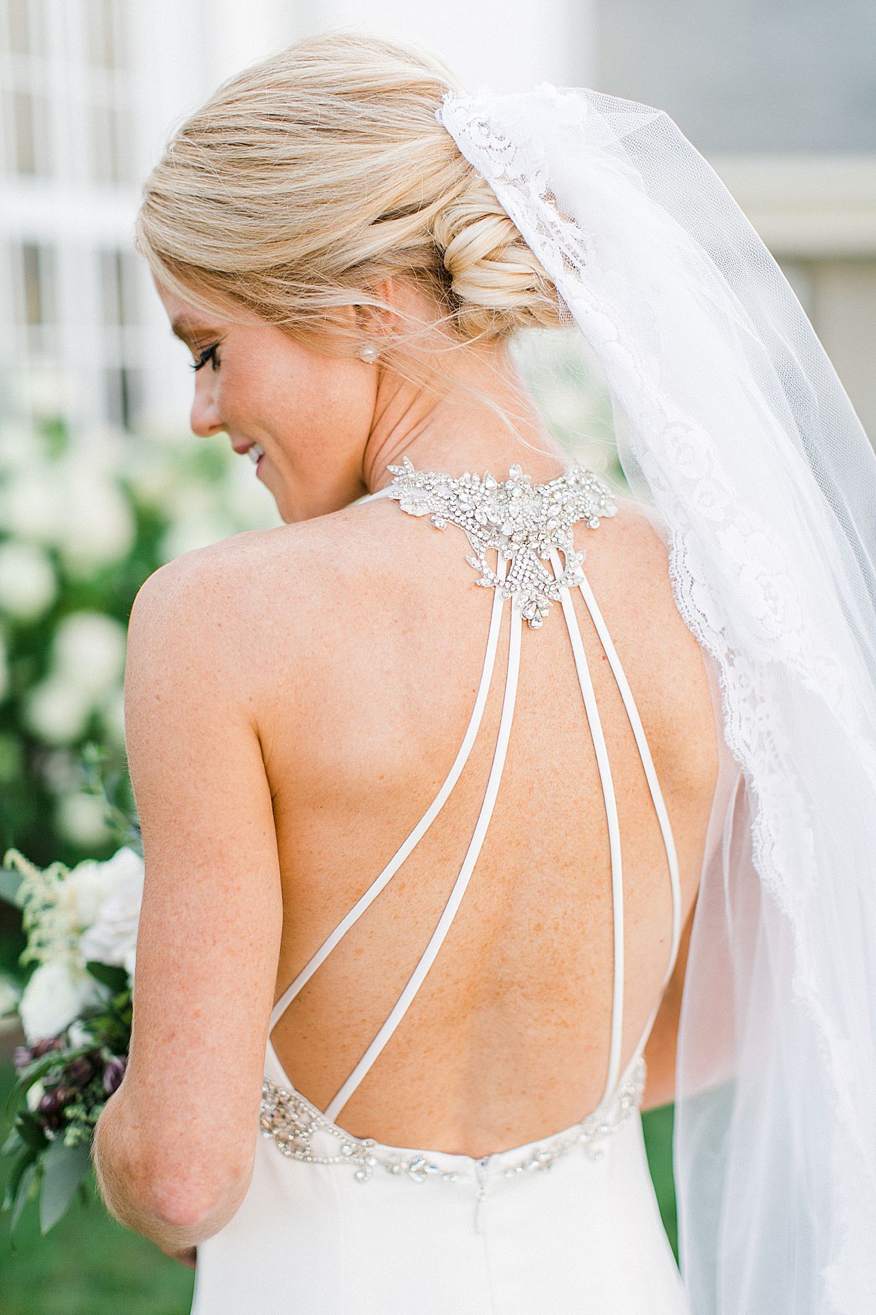 The back of a brides dress in Northern Michigan