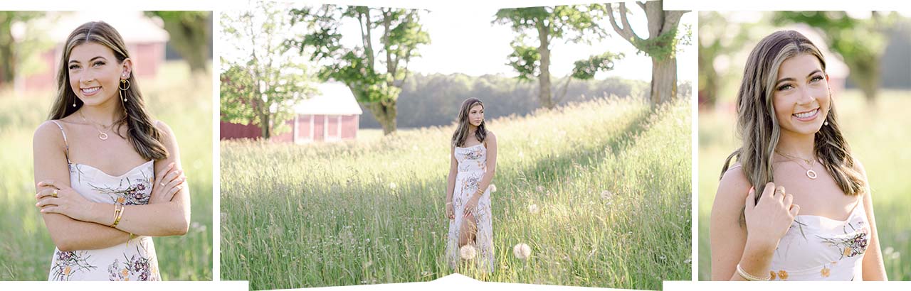 A high school senior girl taking portraits in a field in the summer in Northern Michigan