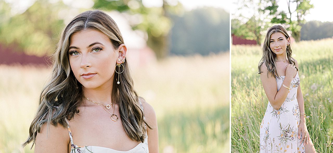 A high school senior girl taking portraits with a white dress on in Charlevoix, Michigan
